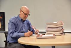 Yossi Sheffi Signing MIT SCM Theses Web.jpg